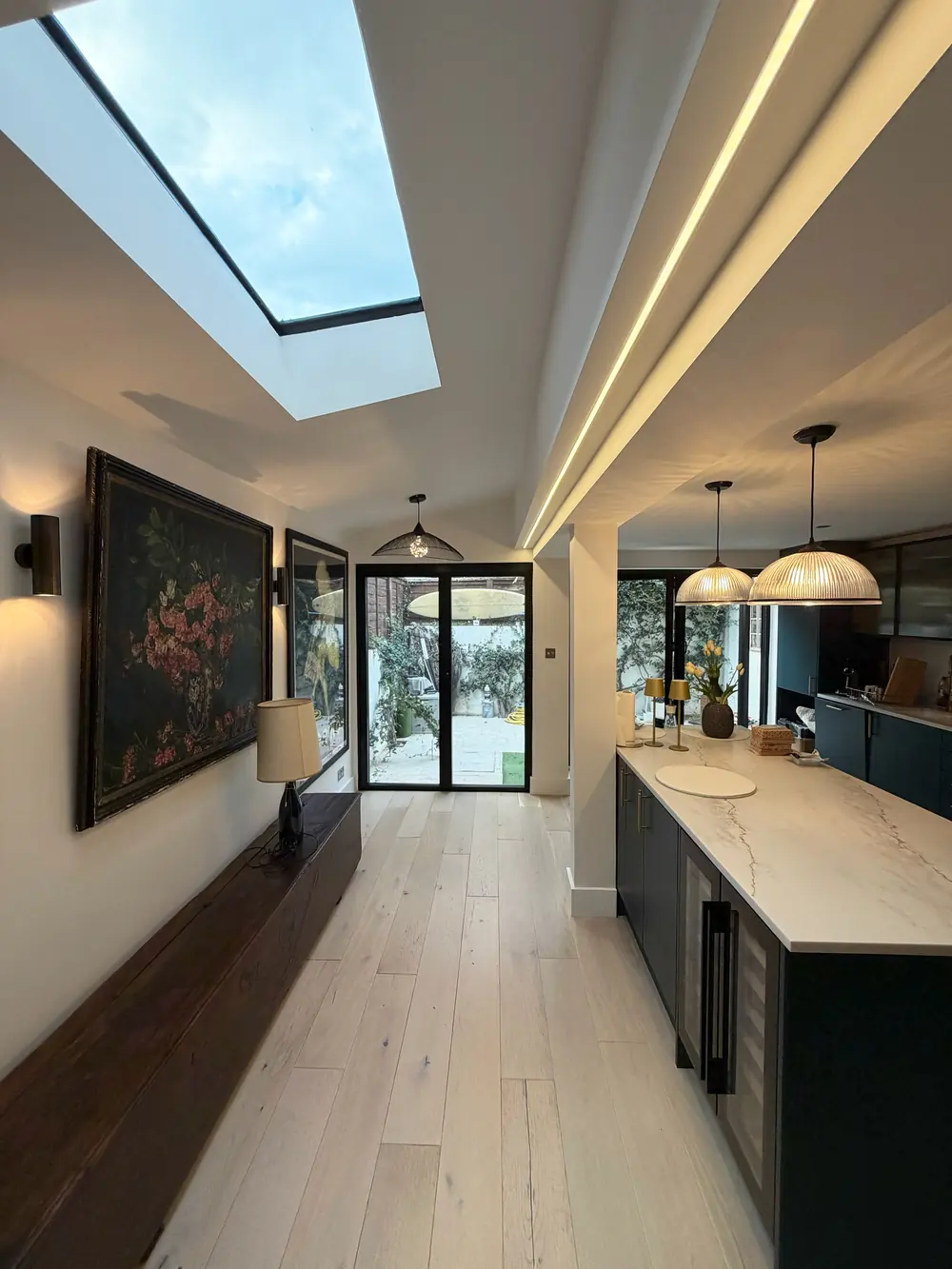 Prothero Road, SW6 7LY — kitchen extension lighting with skylight, LED strip, glass pendants and wall lights